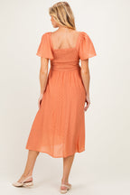 Salmon Polka Dot Smocked Maternity Midi Dress