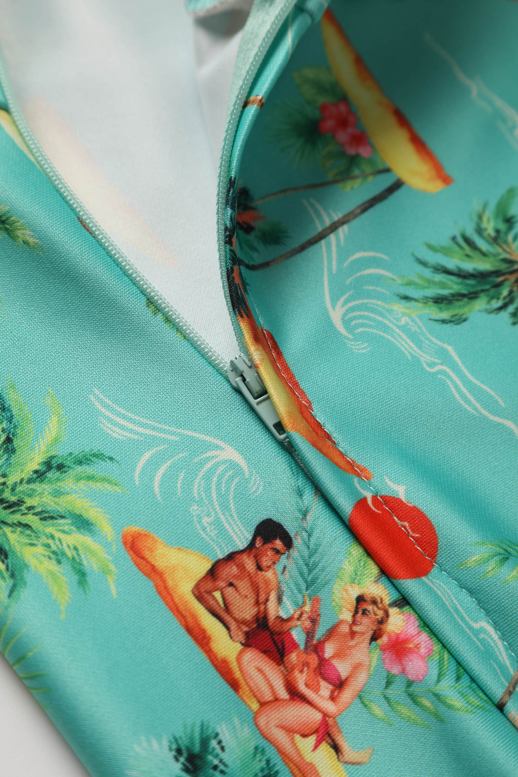 Darlene Turquoise Pinup Swing Dress in Tropical Island Print