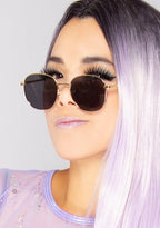 Dime Optics Avalon Sunglasses in matte gold grey — model view