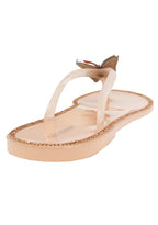 Top-down studio profile of the blush pink jelly sandals, showcasing the contoured footbed and durable rubber traction pattern.