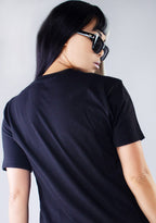 Bioworld Bride of Chucky Unisex Tee in black with Tiffany front graphic on horror fandom rave festival top — back view