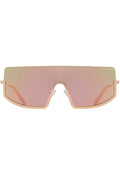 Komono CRAFTED Sonny Heat Sunglasses in pink with oversized curved frame and rose gold metal trim and pink gradient lens on festival sunglasses — front view