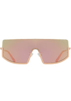 Komono CRAFTED Sonny Heat Sunglasses in pink with oversized curved frame and rose gold metal trim and pink gradient lens on festival sunglasses — front view