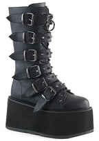 Demonia DAMNED 225 Dark Soul Black Platform Boots in black vegan leather with 6 cone studded buckle straps and EVA foam platform — front view