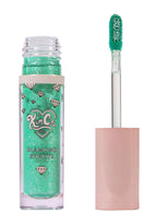Kimchi Chic DIAMOND SHARTS Liquid Glitter Illuminator in 10 Standing Ovation mint with star glitter in twist cap bottle on rave makeup illuminator — swatch view