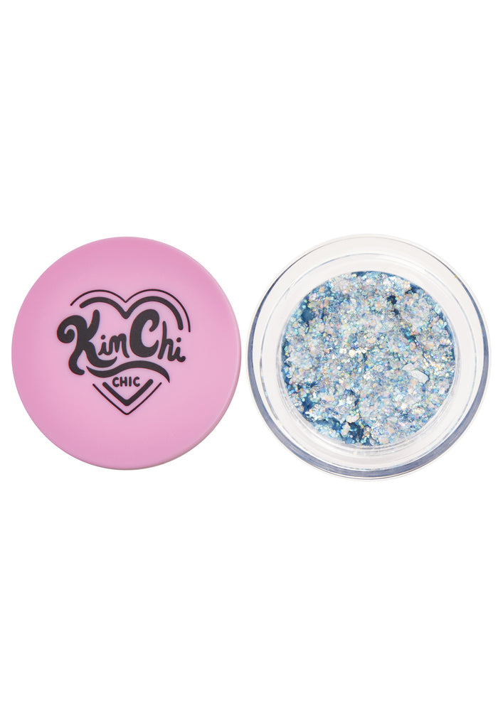 Kimchi Chic GLITTER SHARTS Gel Glitter Pots in 01 Super Galactic blue with holographic star and hexagon glitter in gel pot on rave makeup body glitter — detail view