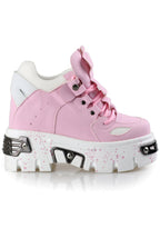 Side studio view of Anthony Wang GUAVA 02 Momo Love Pink platform sneakers featuring a pastel pink vegan leather upper with black graphic line accents, silver metal hardware plates, and a chunky white wedge platform sole