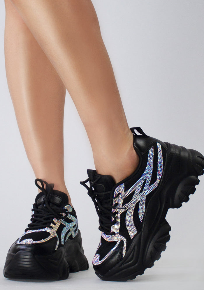 Front view of the black HANNA 02 Endless Mode platform sneakers on-model, showing the clean tongue design, black laces, and textured toe cap.