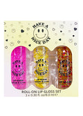 Lavender Stardust Have A Nice Day Lip Gloss Trio Box Set in multicolor with fruity scented roll-on glosses on rave beauty set — front view