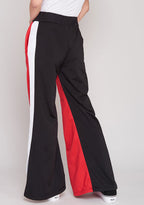 The Ragged Priest Jux Jogger Pants in red multi — back view