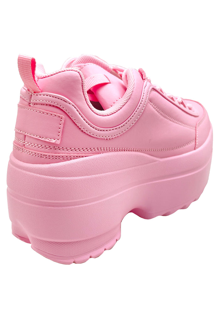 Close-up rear view of the Berness LILY 5005 Sugar Pop pink platform sneaker on-foot, detailing the structured back heel construction, clean tone-on-tone pastel pink stitching, and the substantial depth of the chunky platform rubber outsole.
