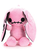 Sleepyville Critters Naughty Bunny Pink Plush Backpack in pink with 3D bunny plush design and skull patch ear accent on kawaii goth rave backpack — front view