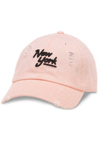 American Needle New York Shred Slouch Raglan Hat in baby pink with embroidered New York logo and distressed detail on cotton twill festival baseball cap — front view