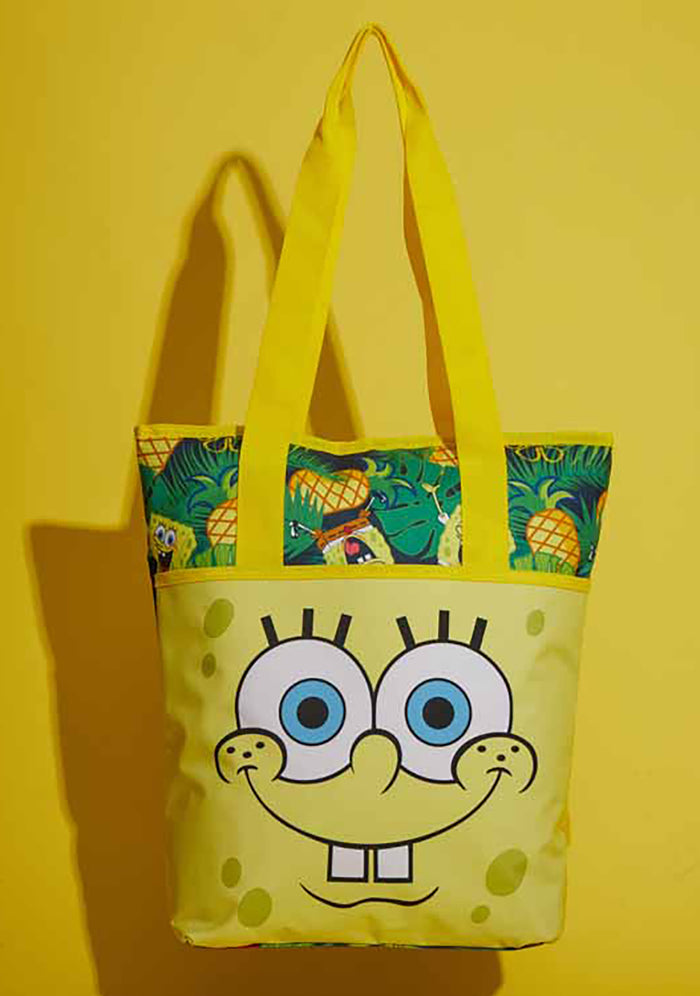 Bioworld Nickelodeon Spongebob Pineapple Insulated Convertible Backpack Tote in yellow multi — model carry view