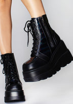 LASR Nightshade Hologram Black Platform Boots — front view