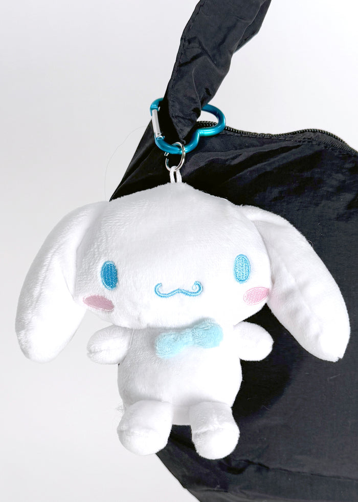 Sanrio Cinnamoroll Plush Mascot Carabiner Pouch in white with 3D Cinnamoroll plush on carabiner pouch festival accessory — model view