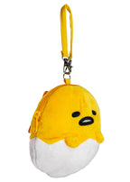 Sanrio Gudetama Die Cut Mini Plush Pouch in yellow white with full-front Gudetama die-cut plush wristlet — side view