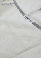 Sanrio Hangyodon Sherpa Zip Up Hoodie in charcoal with Hangyodon embroidery on sherpa-lined zip-up rave festival jacket — embroidery detail view
