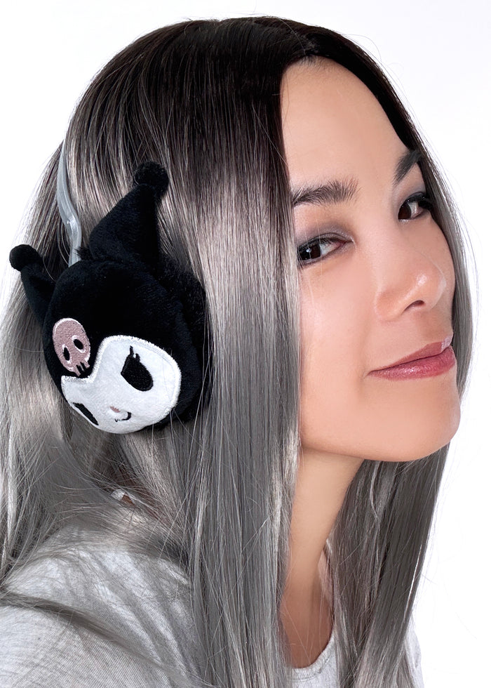 Sanrio Kuromi 3D Plush Earmuff in black with 3D Kuromi plush ear cups on rave festival earmuff accessory — model front view