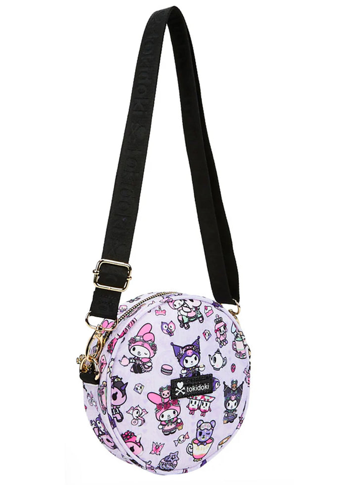 tokidoki x Sanrio Kuromi My Melody Garden Party Round Small Crossbody Bag in purple black with all-over Kuromi and My Melody tea party print on polyester rave crossbody bag — side view