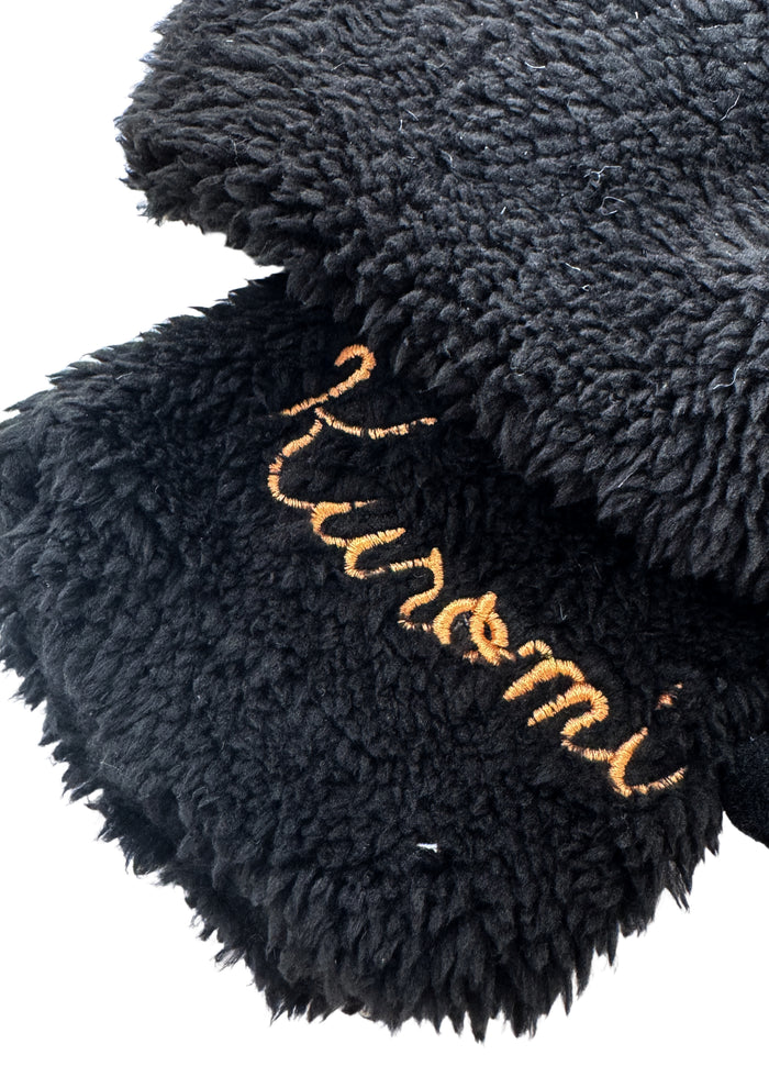 Sanrio Kuromi Plush Muffler Scarf in black with Kuromi plush face on knit muffler rave winter accessory — texture detail view