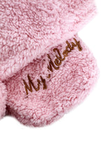 Sanrio My Melody Plush Muffler Scarf in pink with My Melody plush face on knit muffler rave winter accessory — texture detail view