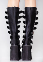 Demonia SWING 815 Beautiful Destruction Black Platform Boots in black vegan PU leather with back zipper closure worn by model — back view