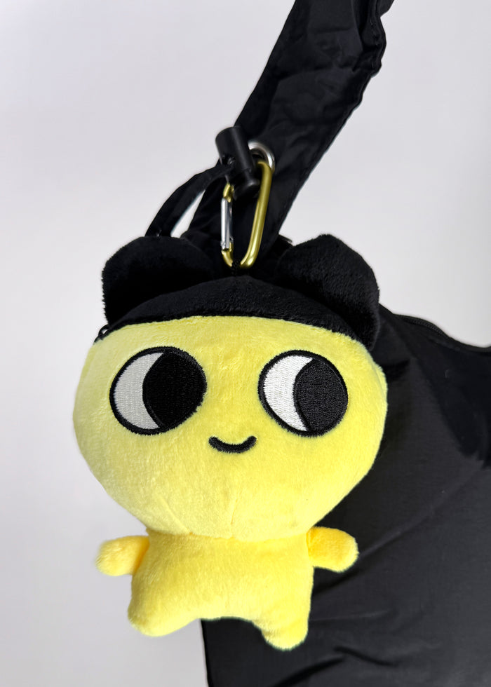 Bandai Tamagotchi Mametchi Plush Mini Pouch in yellow with 3D chibi Mametchi plush design and zipper closure — detail view