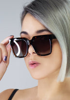 Dime Optics Topanga Sunglasses in tortoise brown gradient — model side view