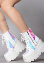 Side profile view of the exclusive Liquid Love rave platform boots, highlighting the vibrant teal and purple shifts of the iridescent python side panels under studio lighting.