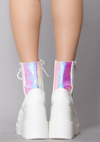 Rear view of the Liquid Love festival boots on-model, detailing the snug ankle fit, clean white back stitching, and the 4.5-inch stacked block heel.