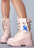 Front on-foot styling view of a pair of Anthony Wang X WTF CV Chem Baby Metal Pink platform boots featuring a classic lace-up front design and heavy industrial-style hardware