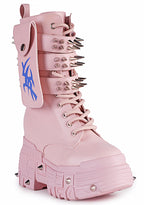 Three-quarter studio view of Anthony Wang X WTF CV Chem Baby Metal Pink platform boots highlighting the blocky toe cap guard, layered structural panels, and alternative festival streetwear silhouette